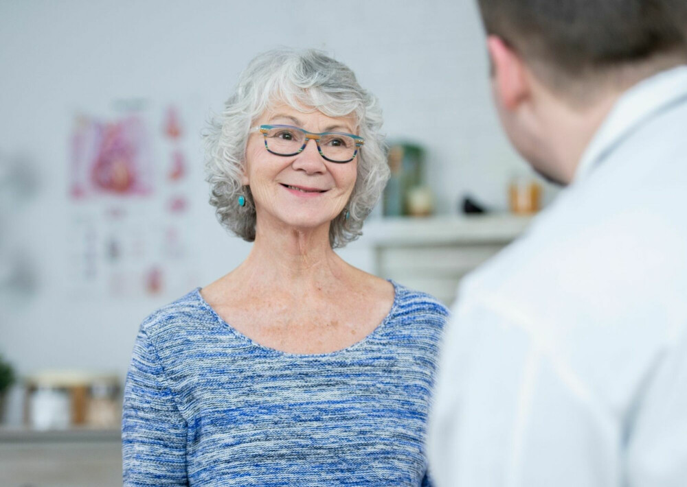 Patiënt in gesprek met behandelaar